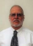 Larry Durandette to Senior Director, Engineering / QMS. 